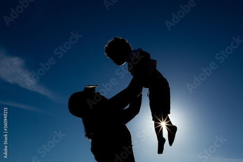 Mayan Riviera, Mexico - Ene 2014 Mother and son relationship concept illustrative portrait