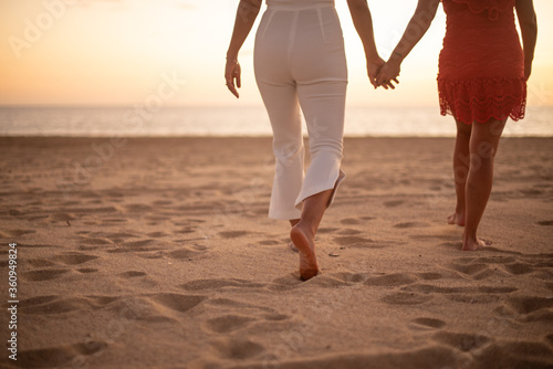 Los Cabos / Mexico- Feb 2019 Lesbian Love concept, sunset Lesbian, adjective to characterize or associate nouns with female homosexuality or same-sex attraction.