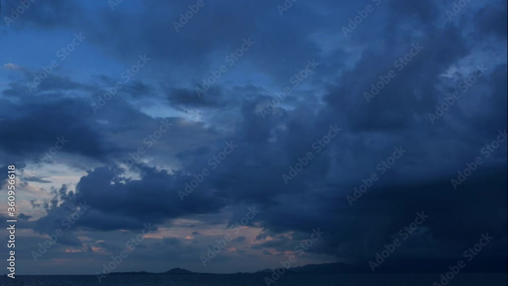Time lapse of rain storm sky with clouds moving above the seascape Time lapse of rain storm sky with clouds moving above the seascape