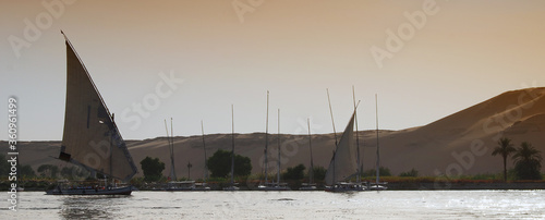 Boats on the Nile river near the Nubian village. Aswan, Egypt