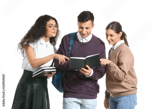 Young students with books o...