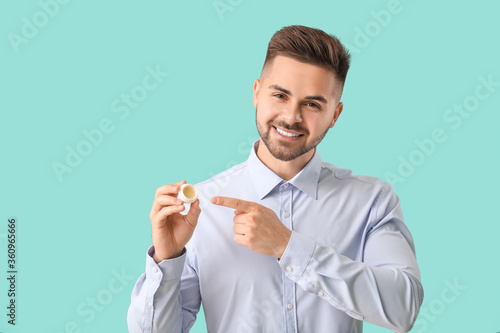 Handsome young man with lip...