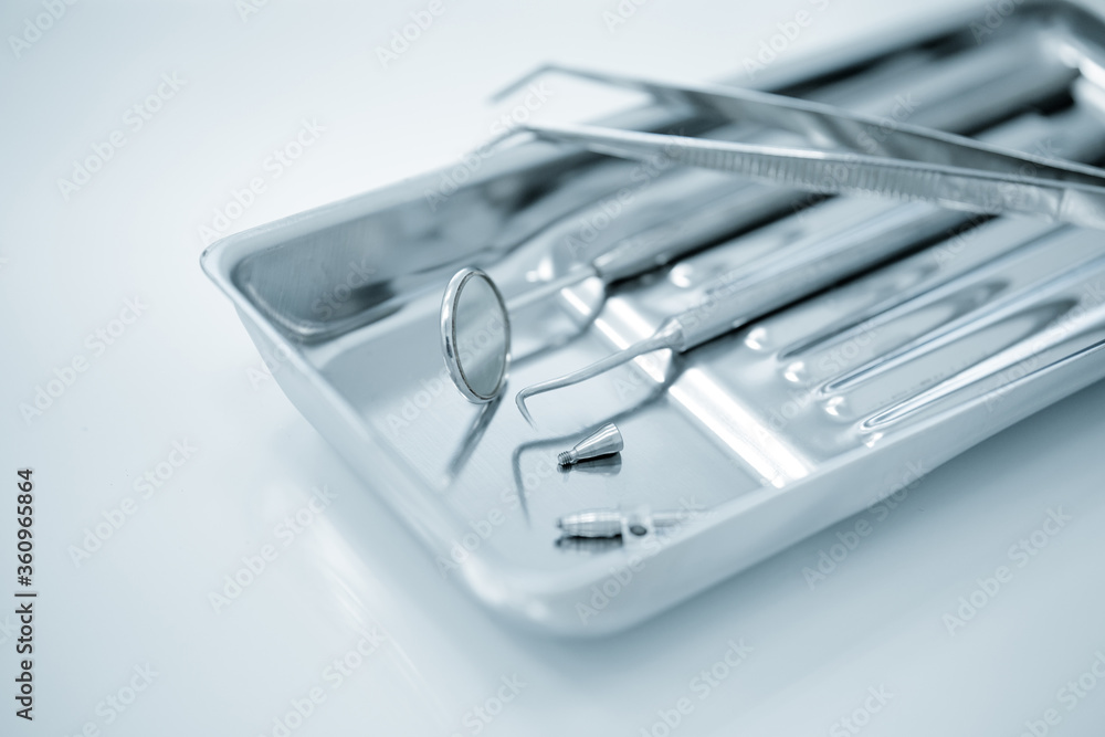 Set of metal dental tools for dental care and prosthetics Set of metal dental tools for dental care and prosthetics