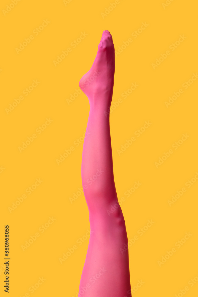 Beautiful young woman in tights on color background Beautiful young woman in tights on color background