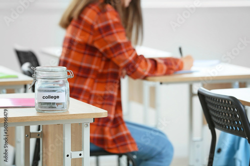 Jar with savings for educat...