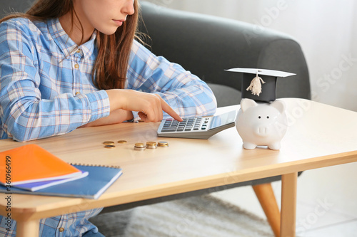 Teenage girl with savings f...