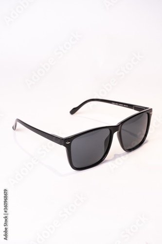 Obraz na plátně Vertical shot of wayfarer sunglasses isolated on white background
