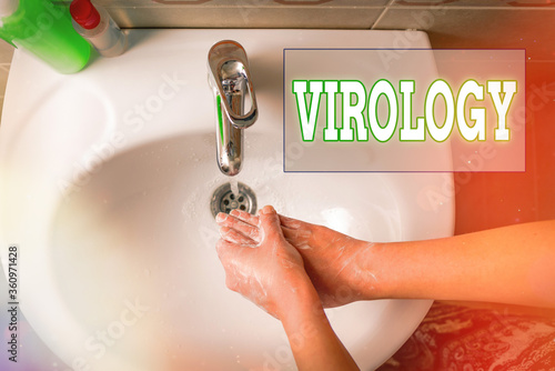 Writing note showing Virology. Business concept for branch of science dealing with the variety of viral agents and disease Handwashing procedures for decontamination and minimizing bacteria photo