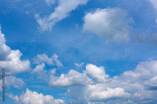 Gray clouds on blue sky background.