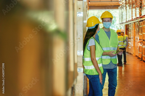 factory warehouse workers wearing face mask at work