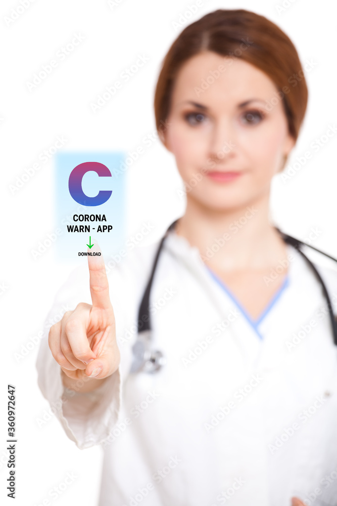 woman is touching a virtual button to download the CORONA WARN APP woman is touching a virtual button to download the CORONA WARN APP