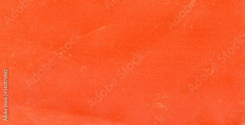 photo texture of old paper in orange hue