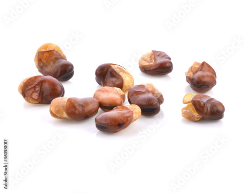 fava bean, roasted and salty on white background