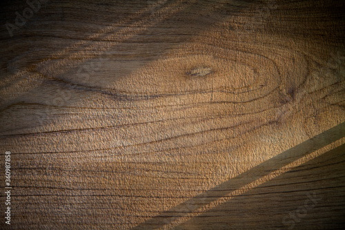 Abstract light and shadow on surface wood wall texture for background.
