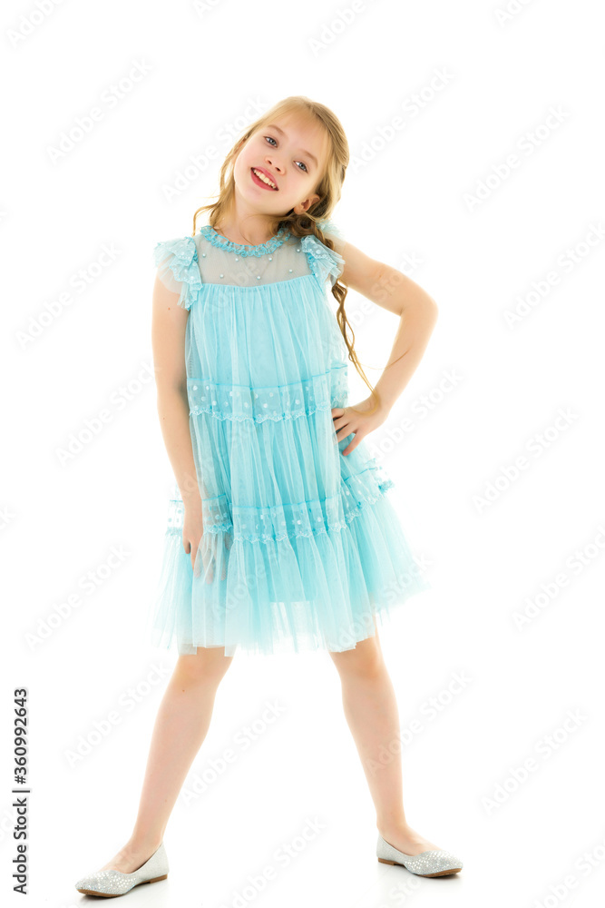 Cute little girl in a light summer dress. Cute little girl in a light summer dress.