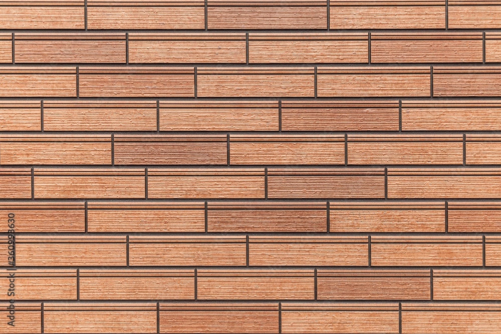 Obraz premium Modern brown stone wall with stripes texture and seamless background