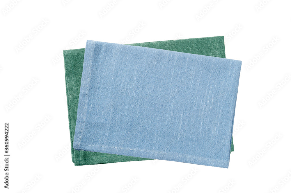 Blue and green cotton napkins isolated on white background Blue and green cotton napkins isolated on white background