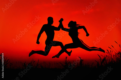 Gender conflict between a man and a woman. Silhouettes of a sports couple