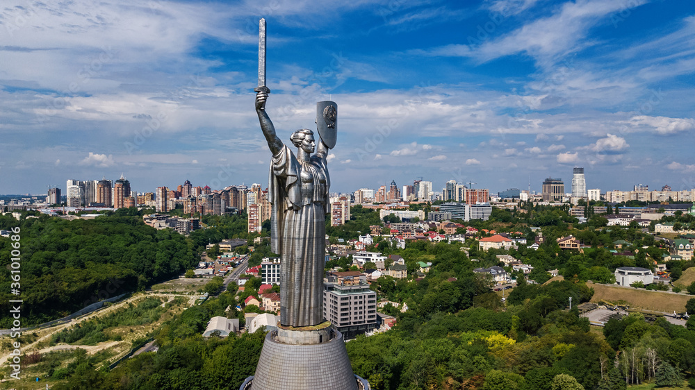 Naklejka premium Aerial drone view of Kyiv city hills and parks from above, Kiev cityscape and skyline in spring, Ukraine 
