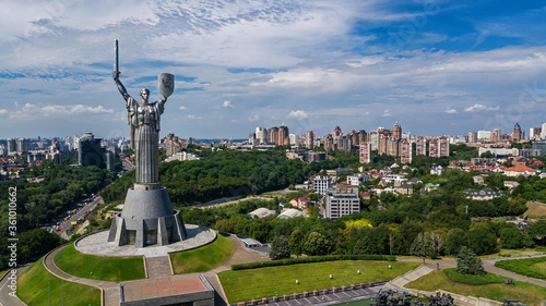 Aerial drone view of Kyiv city hills and parks from above, Kiev cityscape and skyline in spring, Ukraine