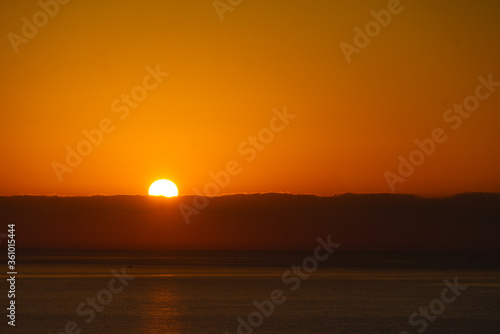 Sunrise over sea. Morning seascape.