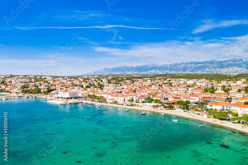 Croatia, beautiful Adriatic coastline, town of Novalja on the island of Pag, city center and marina aerial view from drone 