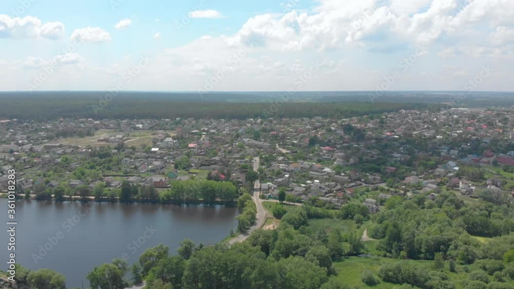 Drone view truck on road lorry UAV surveillance forest lake village aerial bird eye view forward push in camera movement Drone view truck on road lorry UAV surveillance forest lake village aerial bird eye view forward push in camera movement