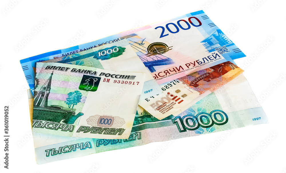 Russian paper money of different denominations on an isolated background Russian paper money of different denominations on an isolated background