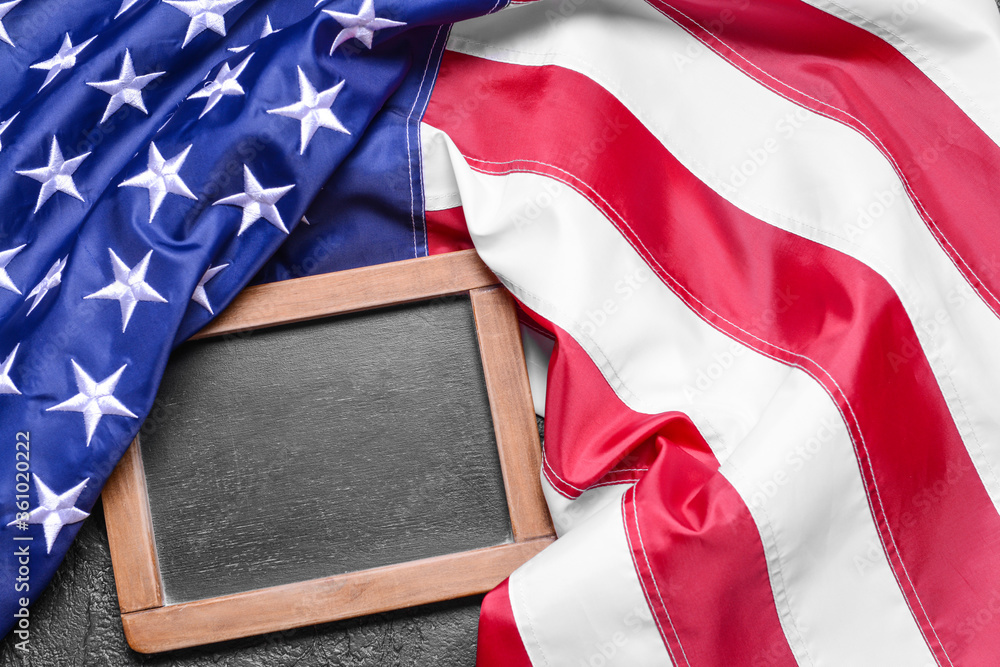 Fototapeta premium USA flag and chalkboard on dark background