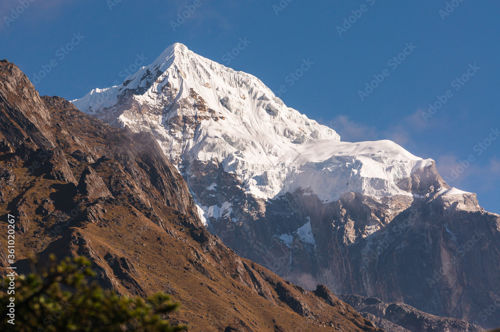 Taboche mountain peak in a morning. Snow mountain peak view from Tengboche village. Beautiful Himalaya mountains landscape in Everest base camp trekking route in Nepal
