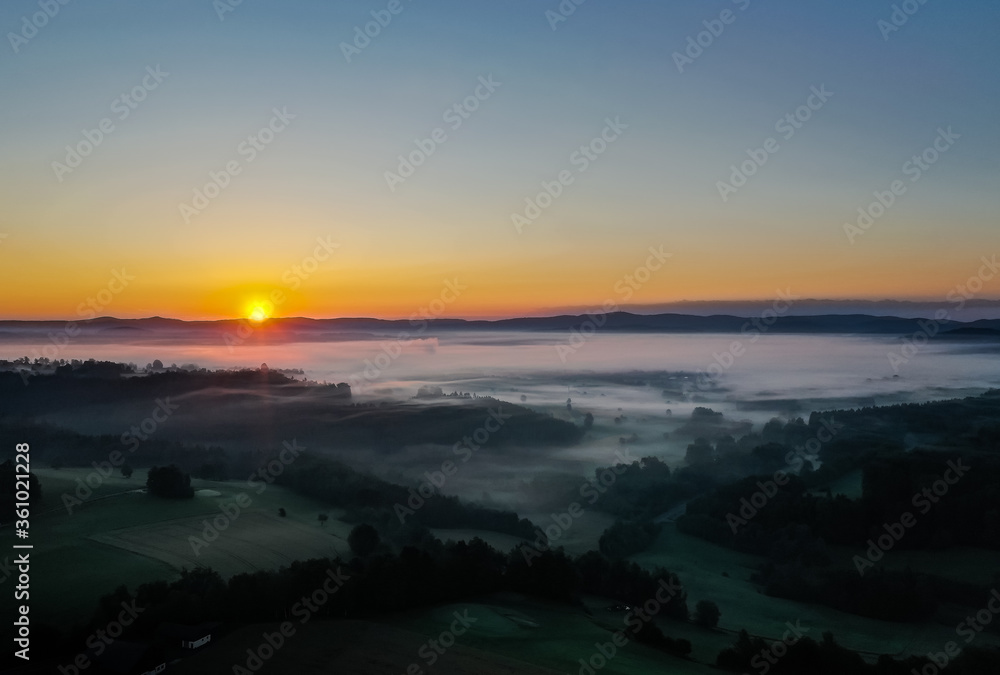 Fototapeta premium Drone panorama photo - dawn with early fog at blue hour