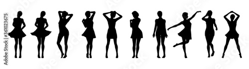 Set of beautiful a fashion girls in short dress. Silhouette of young woman. Vector illustration.