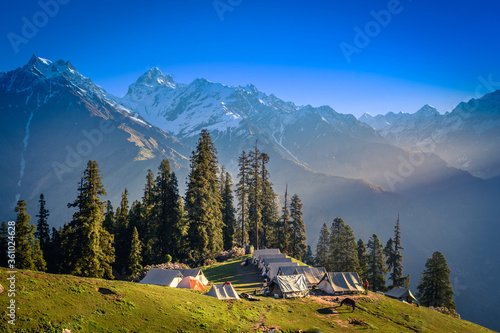 Scenic sunrise view from Camping site of the Himalayan mountains,on trek to Sar pass Kasol, Parvati valley, Himachal Pradesh, northern India.