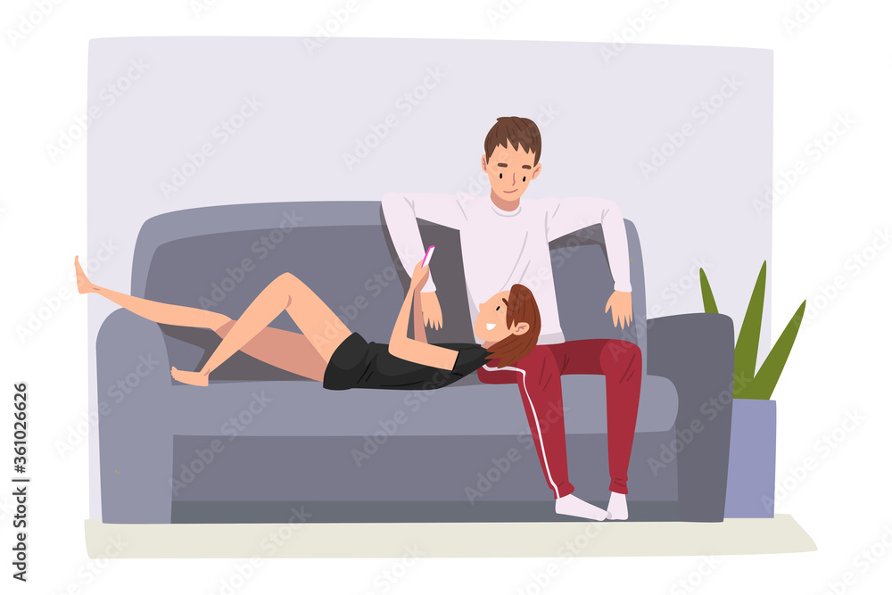 Cheerful Couple Sitting on Sofa at Home, Male and Female Characters Spending Time Together at Home, Girl Using Smartphone Vector Illustration Cheerful Couple Sitting on Sofa at Home, Male and Female Characters Spending Time Together at Home, Girl Using Smartphone Vector Illustration