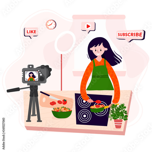 Video Blogger cooking online home. Vlogger making food in kitchen. Woman records culinary podcast with camera. Streaming about diet, healthy meal.