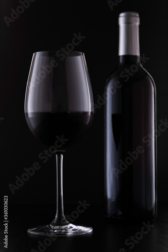 glass and bottle of red wine