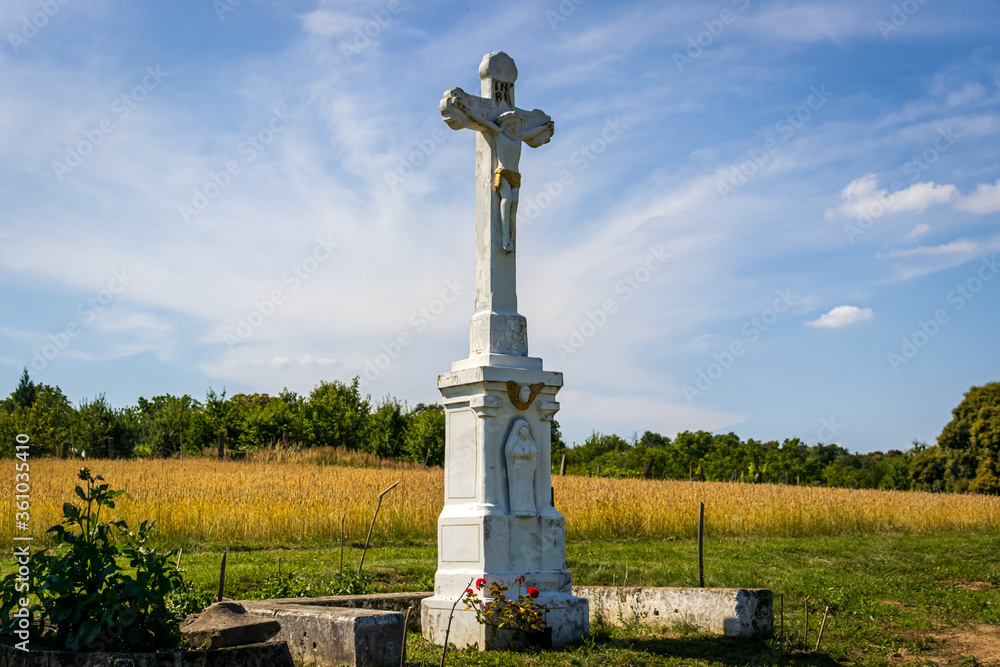 A cross next to the field