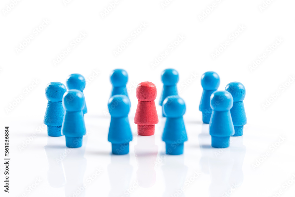 A wooden chess piece shaped like a human figure A wooden chess piece shaped like a human figure