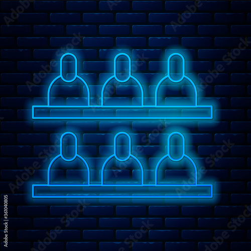 Glowing neon line Jurors icon isolated on brick wall background. Vector Illustration.