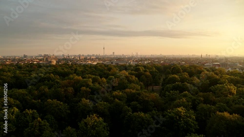 Scenic view treetops and cityscape, Berlin, Germany photo