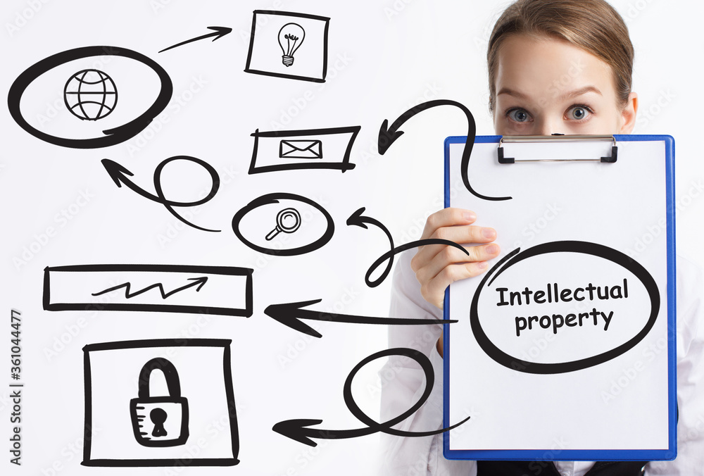 Business, technology, internet and network concept. Young businessman thinks over the steps for successful growth: Intellectual property Business, technology, internet and network concept. Young businessman thinks over the steps for successful growth: Intellectual property