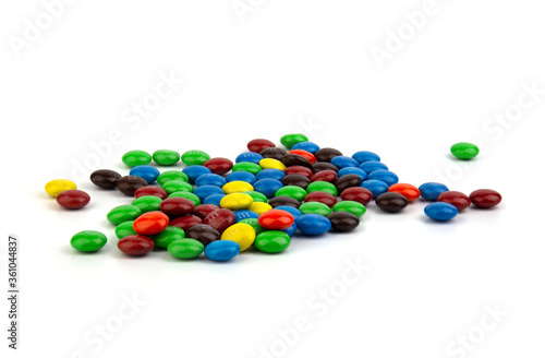 Suratthani Thailand - June 29, 2020: M&M's candies. M&M's produced by Mars, Incorporated. Close up of a pile of colorful chocolate coated candy, chocolate pattern, candies background