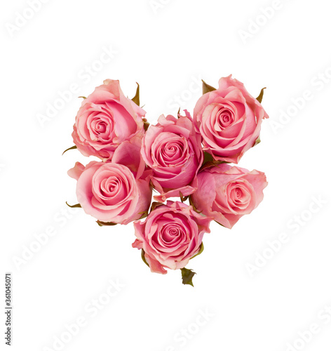 Pink roses gathered in a shape of a heart
