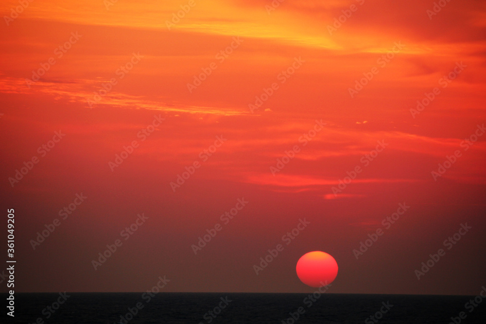 Picturesque red-yellow sunrise over the Black Sea.