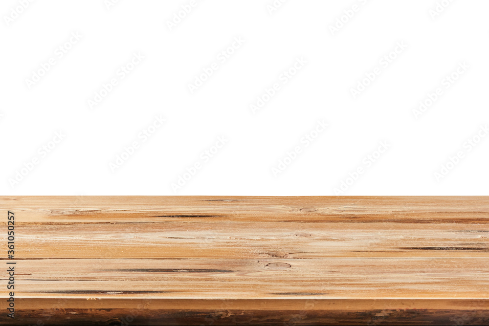 Aged natural wooden table for montage or expose products on a white background.