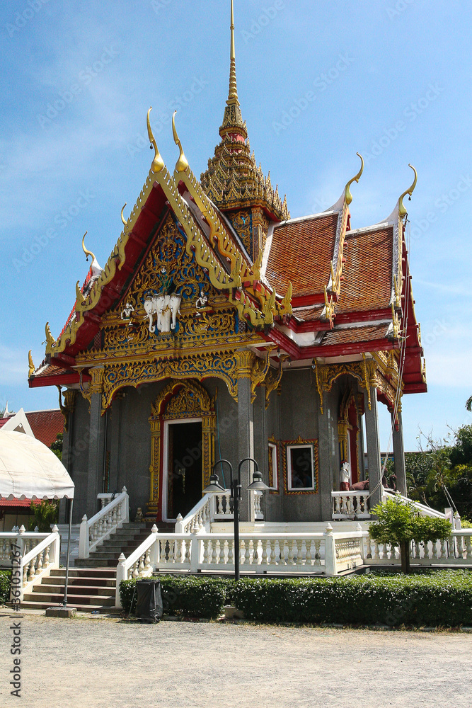 Beautiful carved gilded Buddhist pagoda at Wat Chalong Temple. Religion. Thailand. Journey. Travels