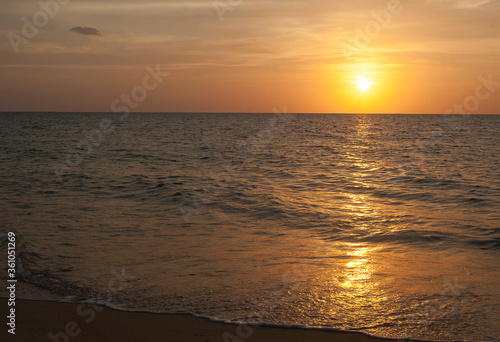 Fototapeta Naklejka Na Ścianę i Meble -  Sunset on the Andan Sea in Phuket in Thailand. May kao. Summer. Tourism. Travels.