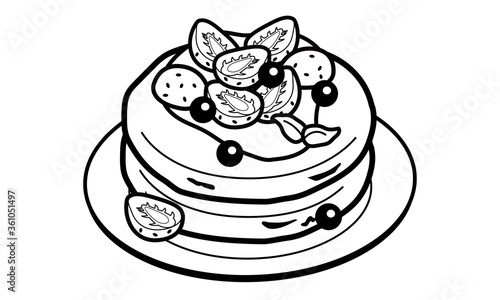お皿に乗ったブルーベリーといちごのパンケーキ