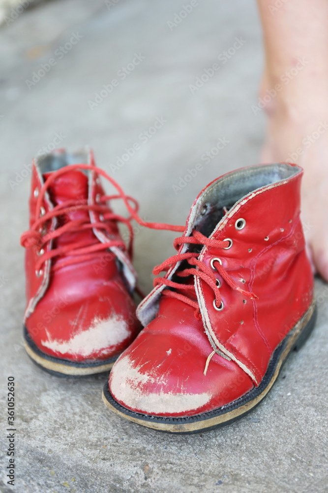 old red children pair of leisure boots