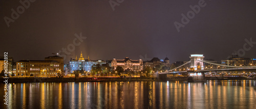 Night lighting view to the historical part and Chain bridge across the river in Budapest, Hungary